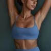 Growth - Scoop Neck Open Back Sports Bra In Blue