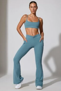 Realign - Twist Waist Flare Leggings In Slate Blue