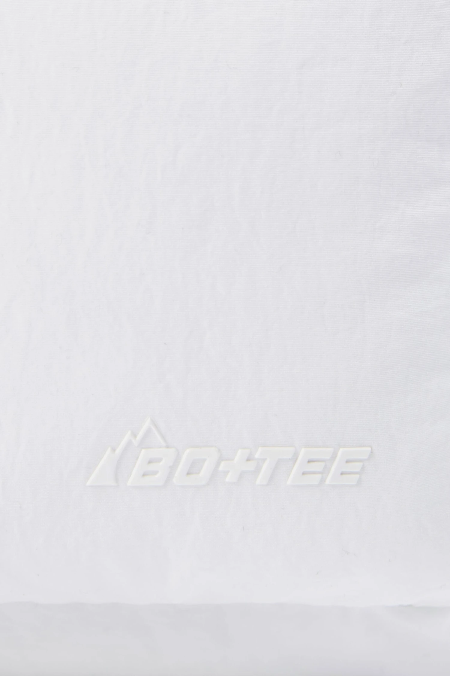 Arctic - Quilted Puffer Bag In White - Image 8