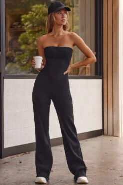 Tranquility - Soft Rib Bandeau Flare Jumpsuit In Black