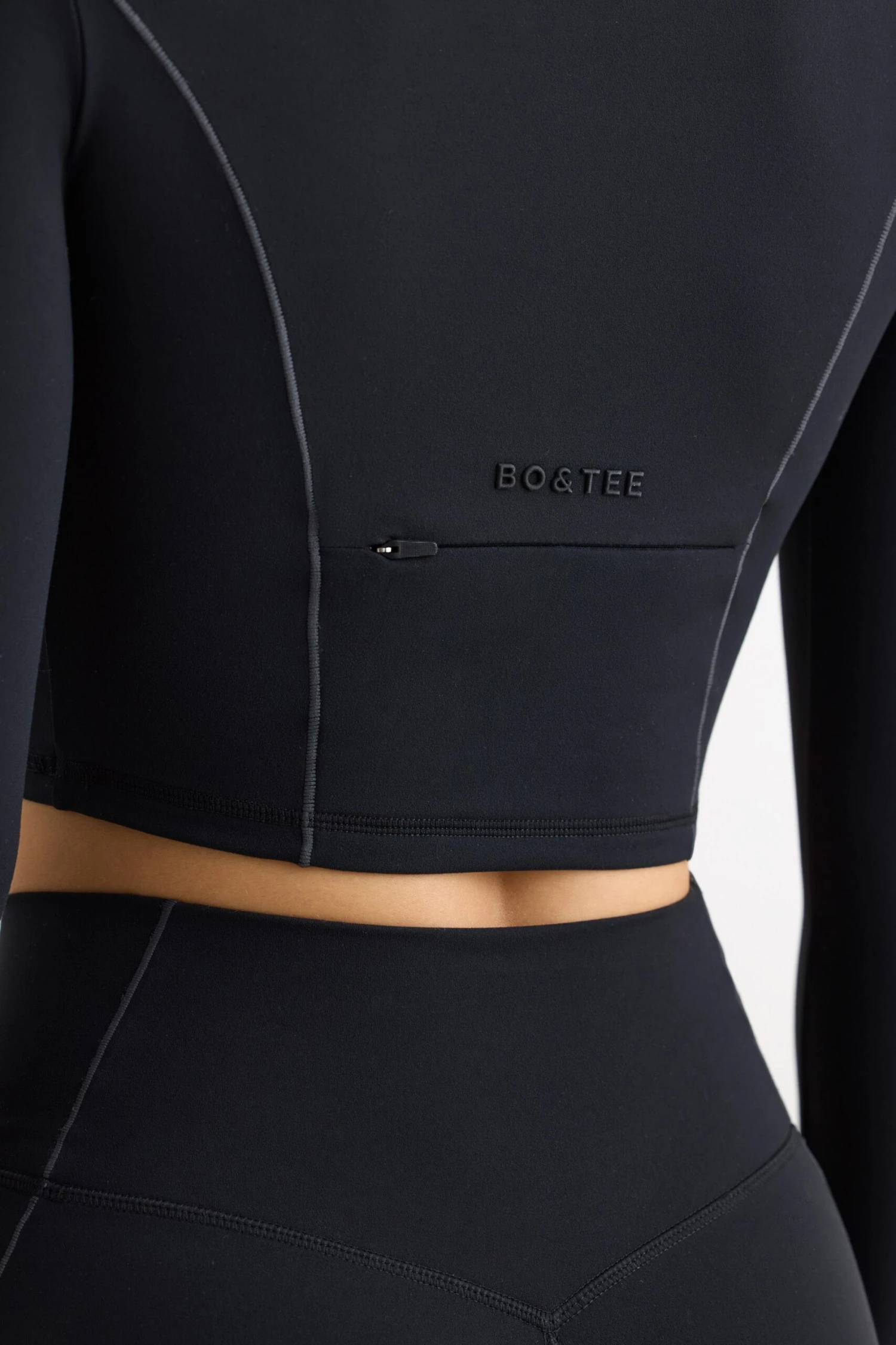Process - Soft Active Half Zip Crop Top In Black - Image 4